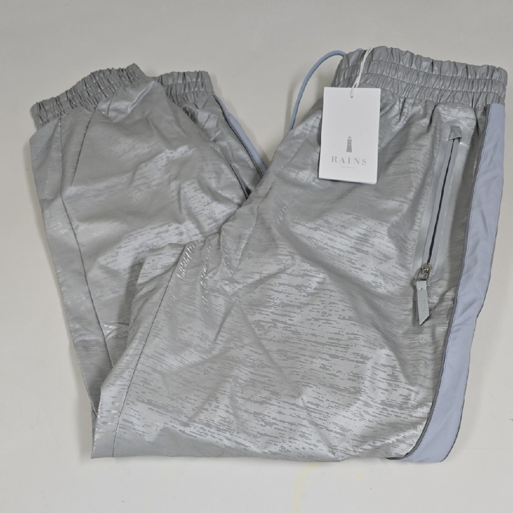 Rains Ltd. Enlightened Capsule Collection Track Pants Dripping Silver